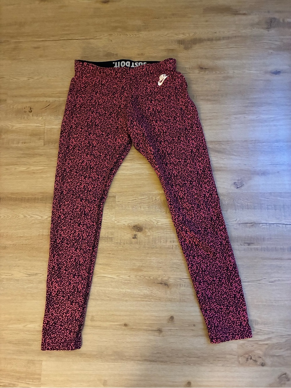 Nike women Pink and Black Printed Leggings